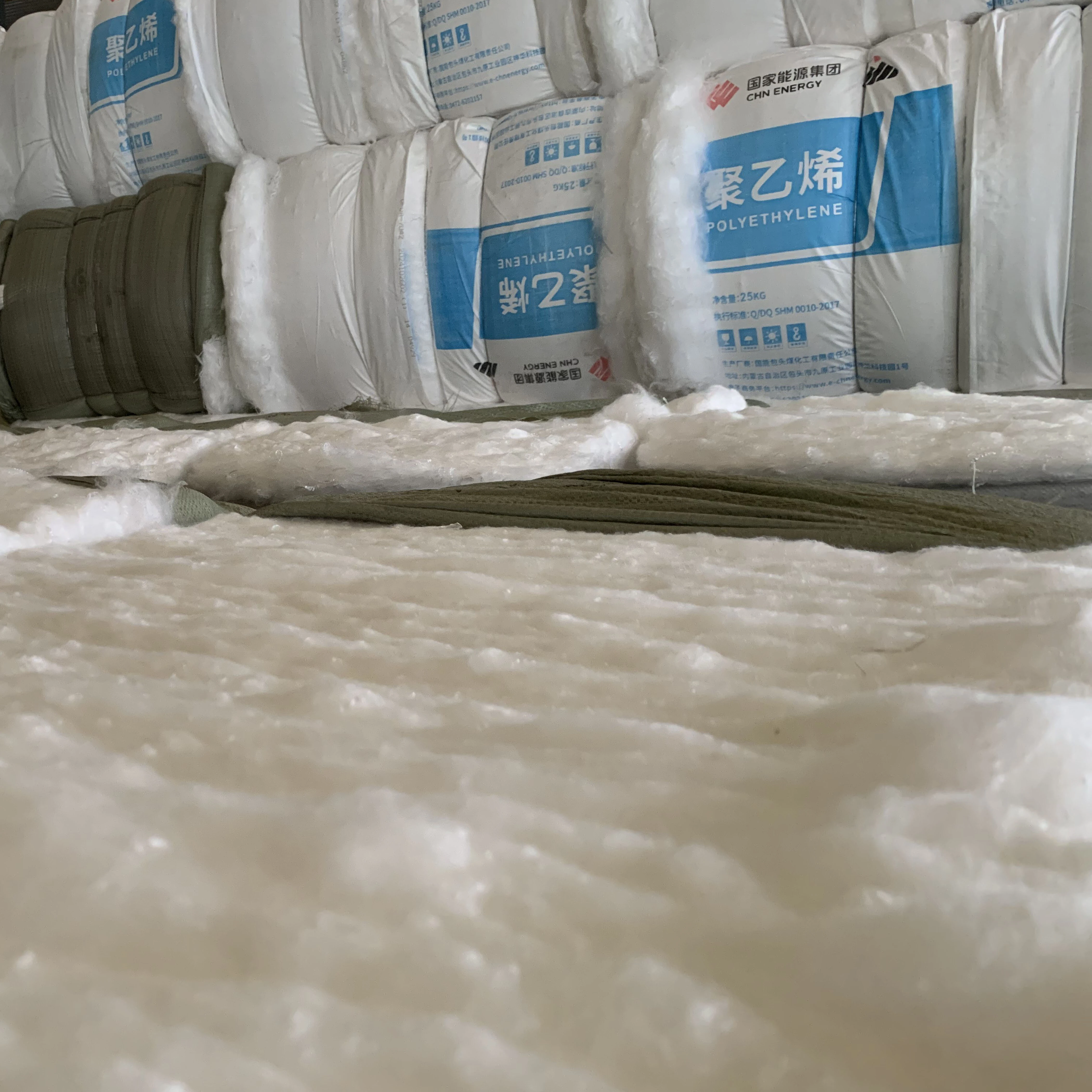 Short fiber needle-punched reinforced nonwoven geotextile