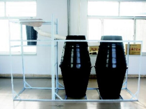 Integrated injection molded double urn hopper septic tanks