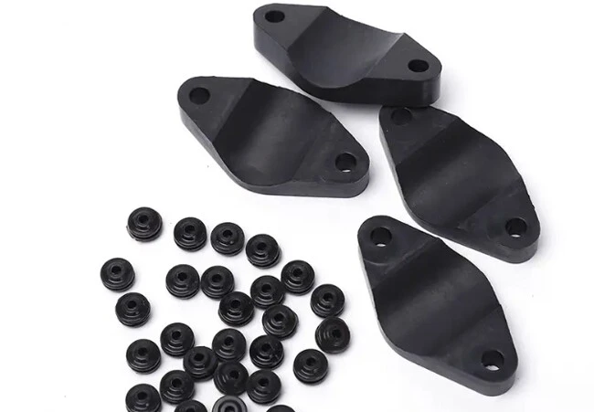 Injection molding machine vibration damping feet