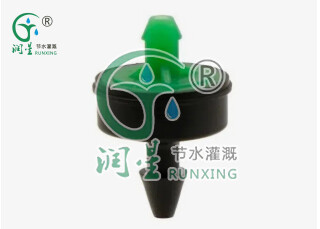 Sur le tube extérieur - compte-gouttes anti-goutte et compensateur de pression