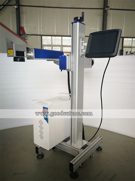 Machine de marquage volante pour convoyeur à bande