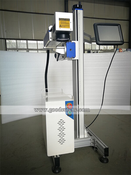 Machine de marquage volante pour convoyeur à bande