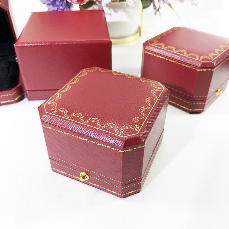 Red jewelry box for proposing with a diamond ring