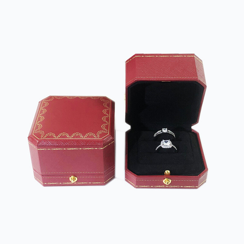 Red jewelry box for proposing with a diamond ring
