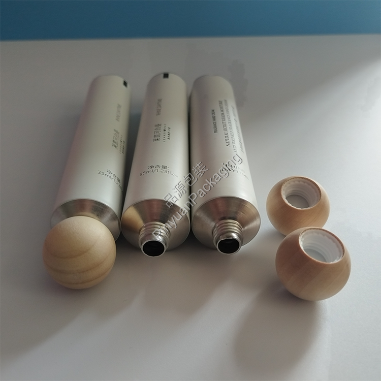 D25 35ml Hand Cream Pure Aluminum Cosmetic Tube with Wooden Ball Screw Cap