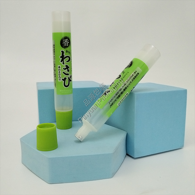 D22 35ml ​Wasabi Transparent PE Cosmetic Tube with Light Green Ribbed Screw Cap