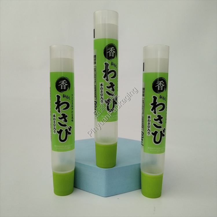 D22 35ml ​Wasabi Transparent PE Cosmetic Tube with Light Green Ribbed Screw Cap