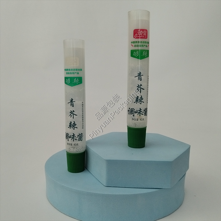 D22 43g ​Mustard Transparent PE Cosmetic Tube with Green Ribbed Screw Cap