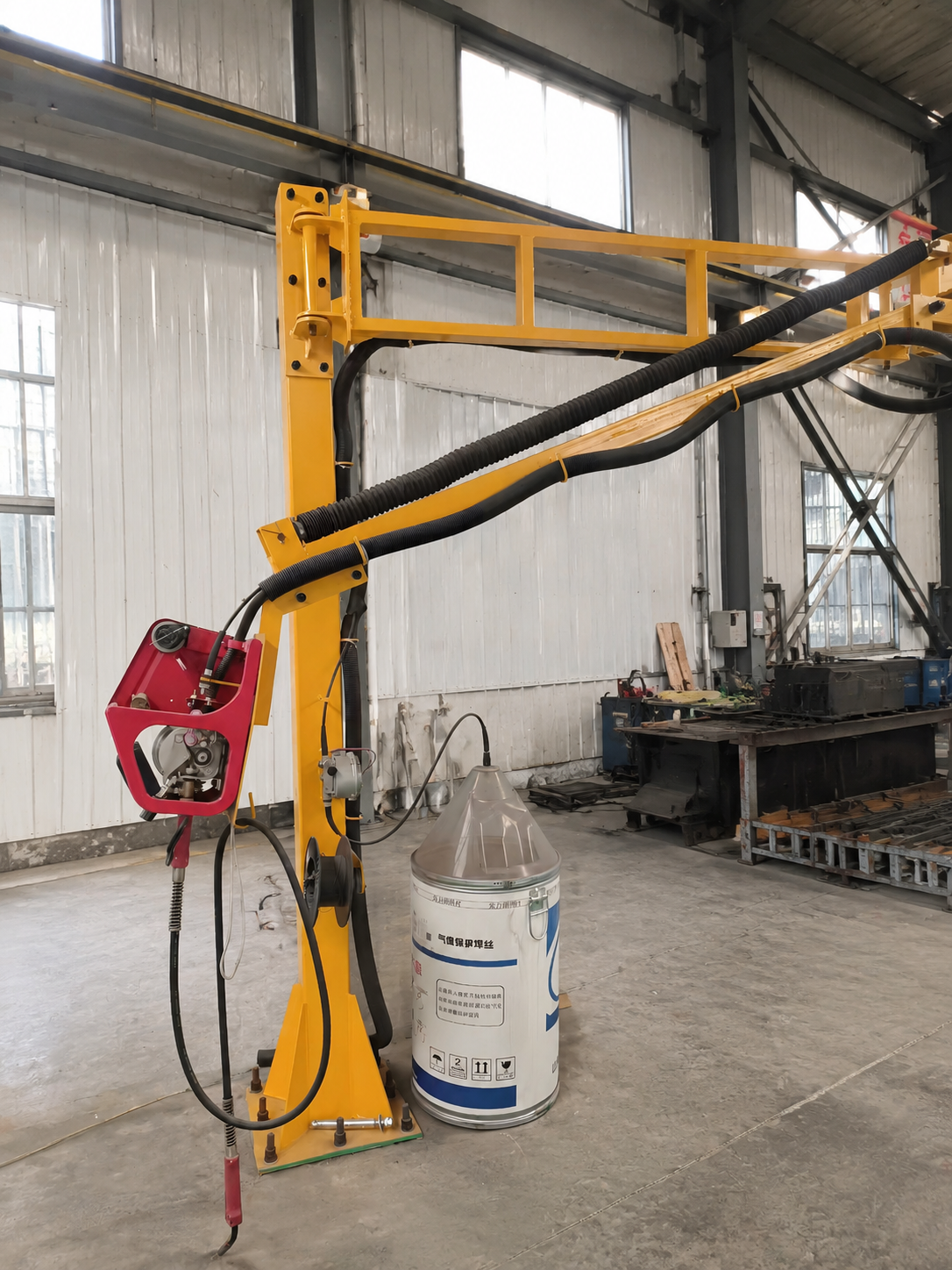 Spring welding boom