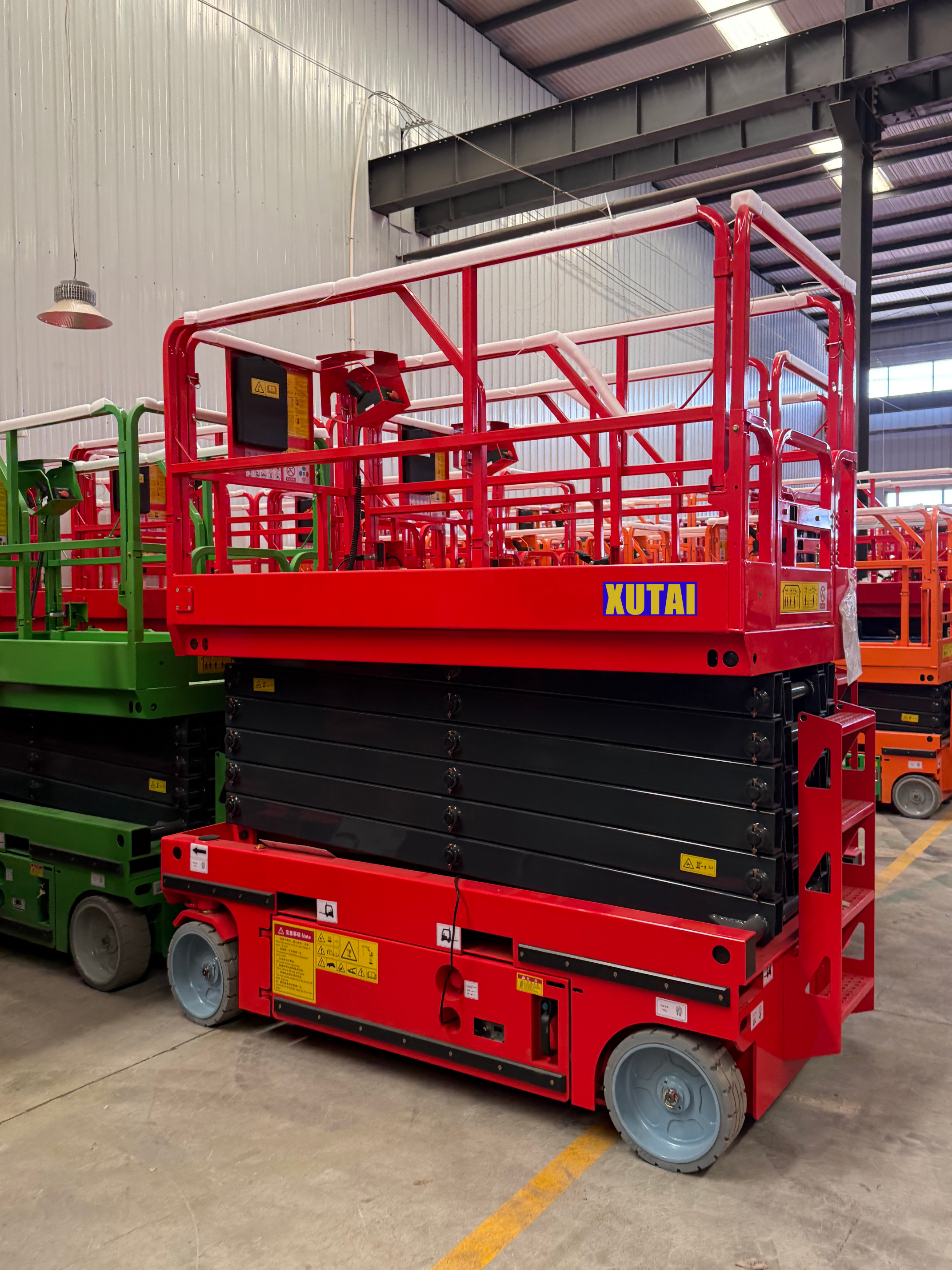 Xutai Machinery offers customizable scissor lifts with platform heights ranging from 4 to 14 meters, flexibly meeting diverse high-altitude work needs.