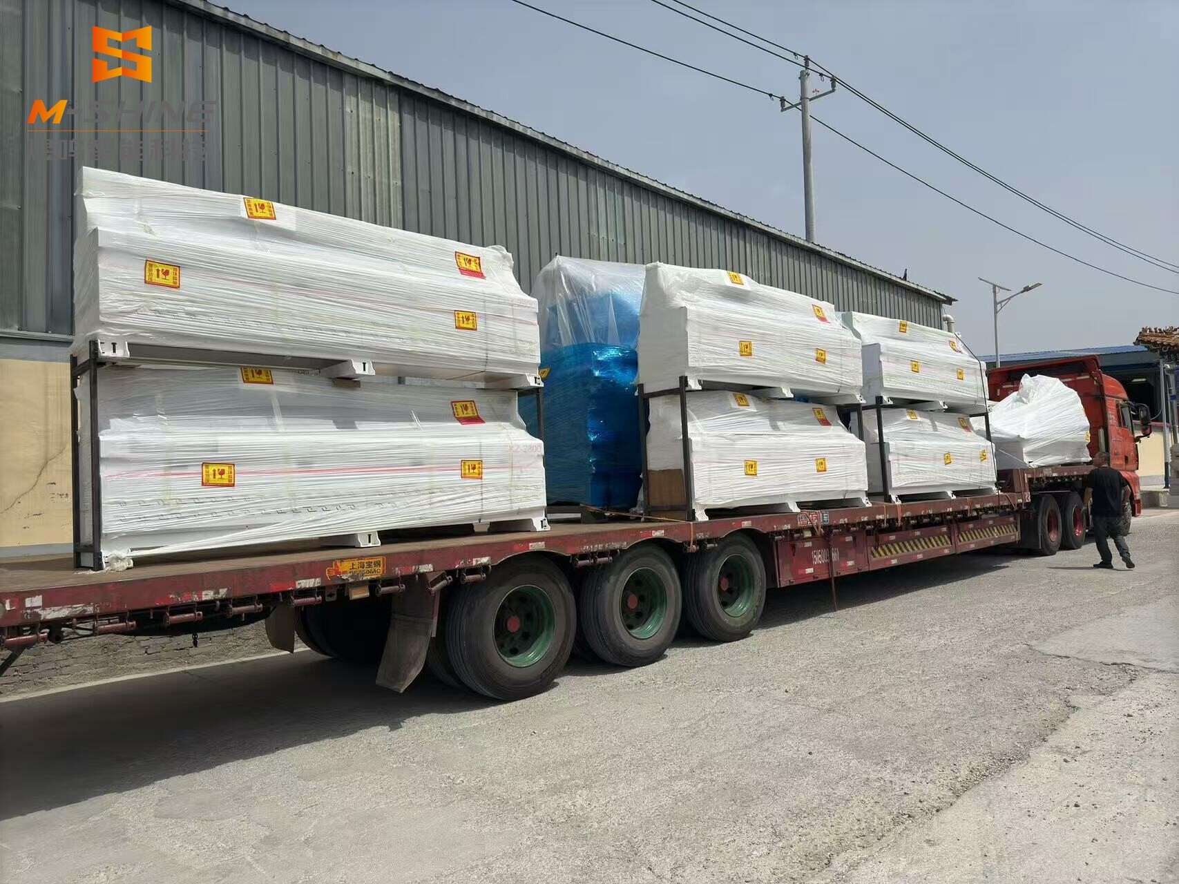 Multiple side hole machines and straight atc cnc router production lines depart for Russia