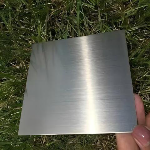 Does brush finishing a 316 stainless steel plate affect its corrosion resistance?