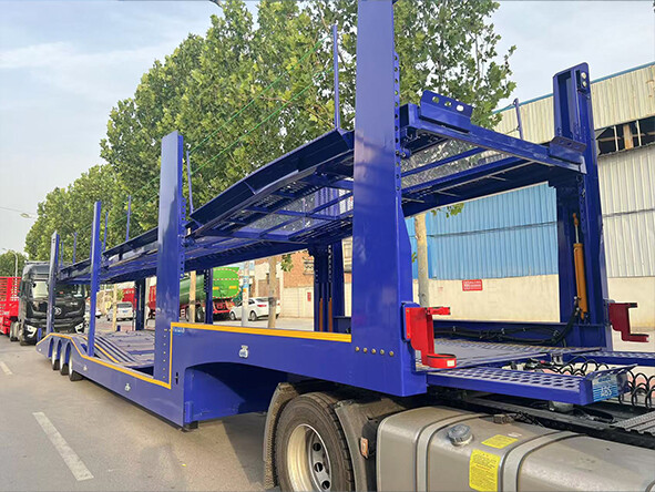 How is the flat bed trailer transported in a container?