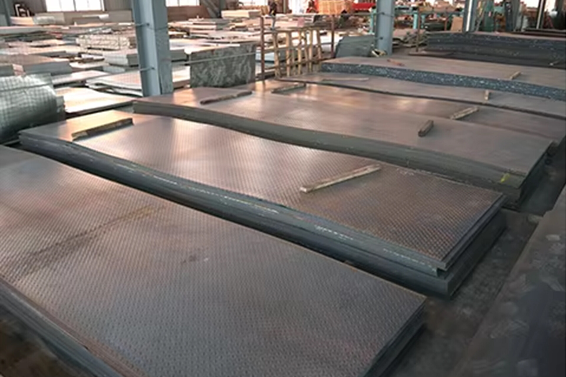 What are the applications of pattern plates in automobile manufacturing?