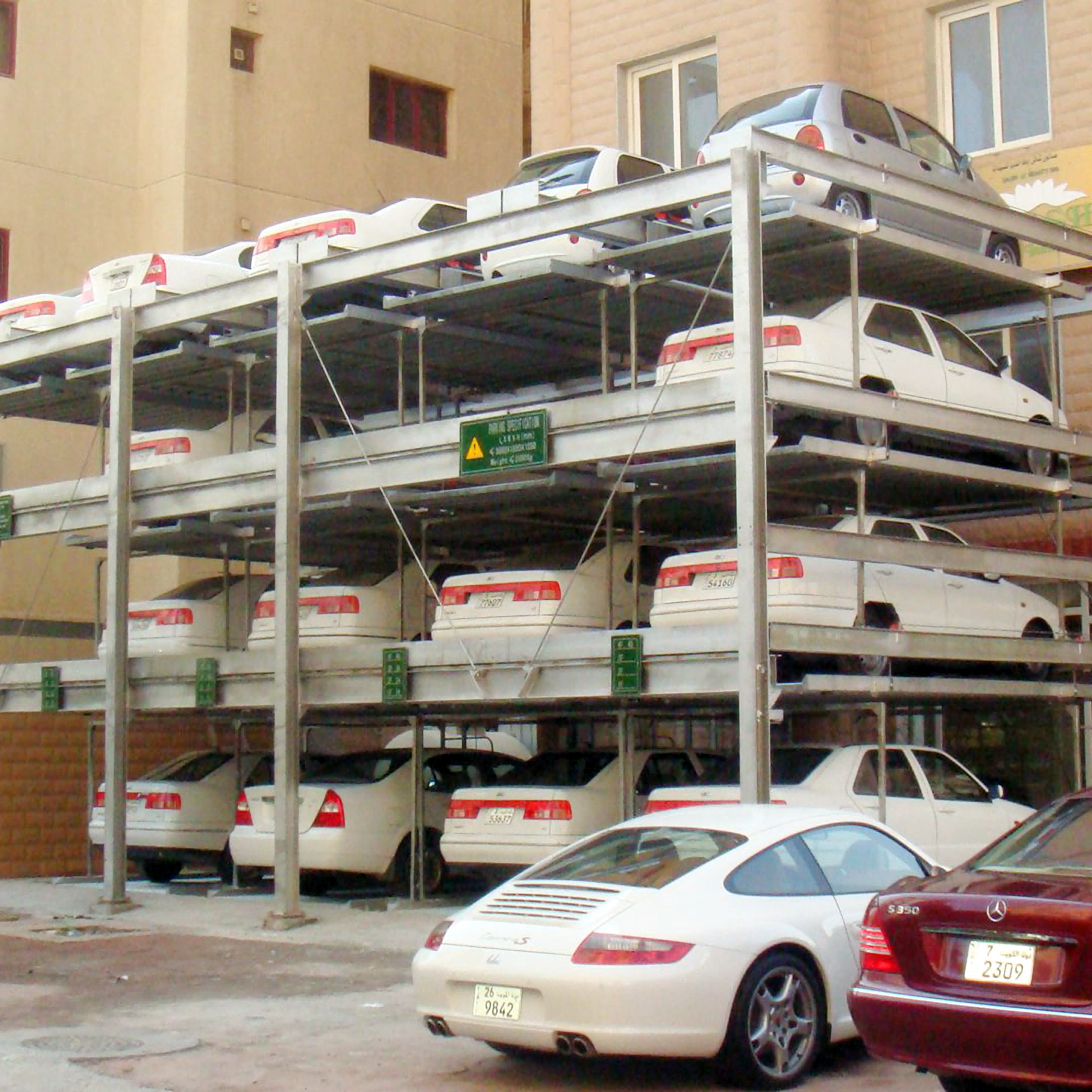 Kuwait - 4 level puzzle parking system - 51 car spaces Kuwait - 4 level puzzle parking system - 51 car spaces