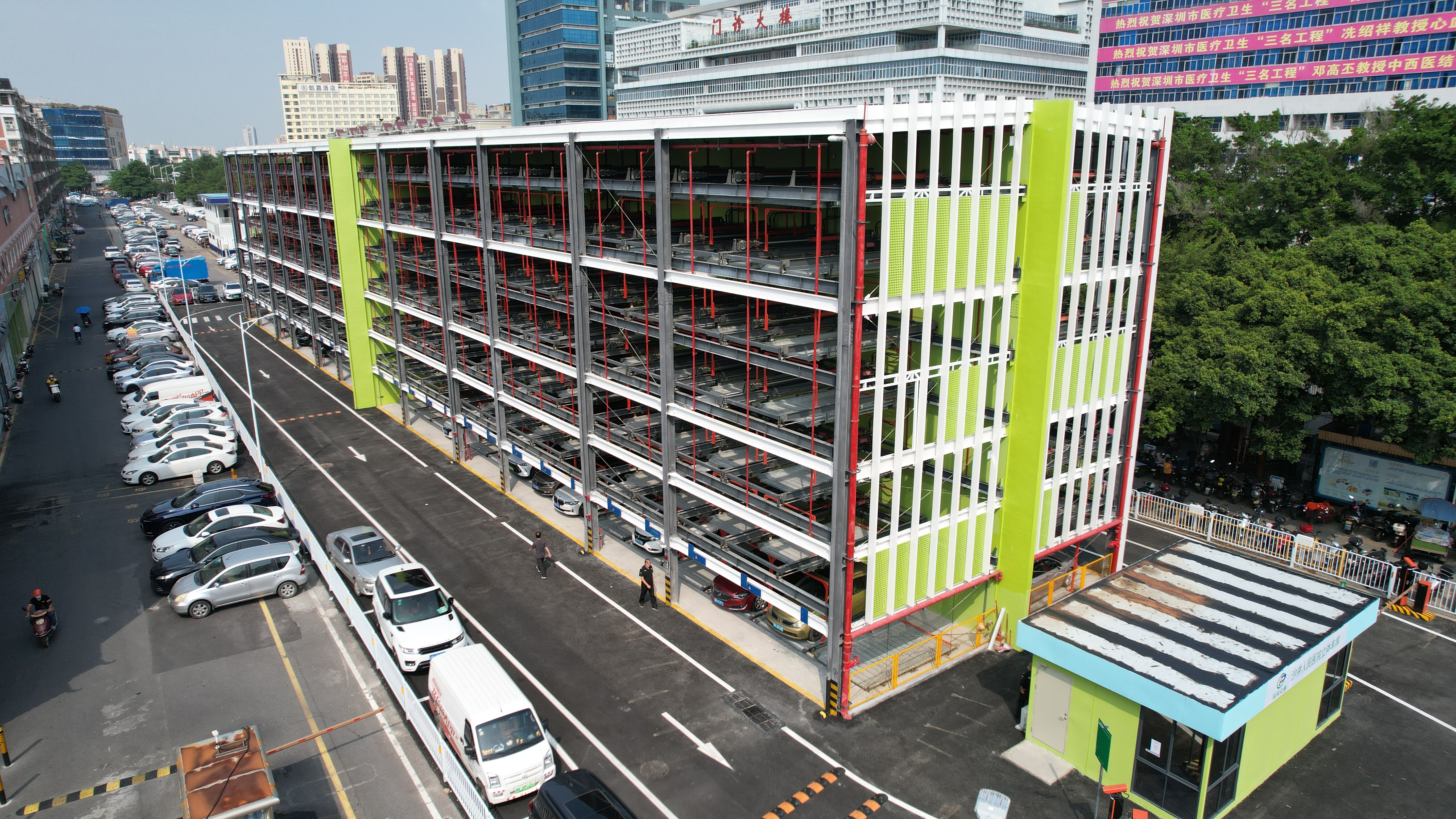 China - 7 level puzzle parking system -  348 car spaces