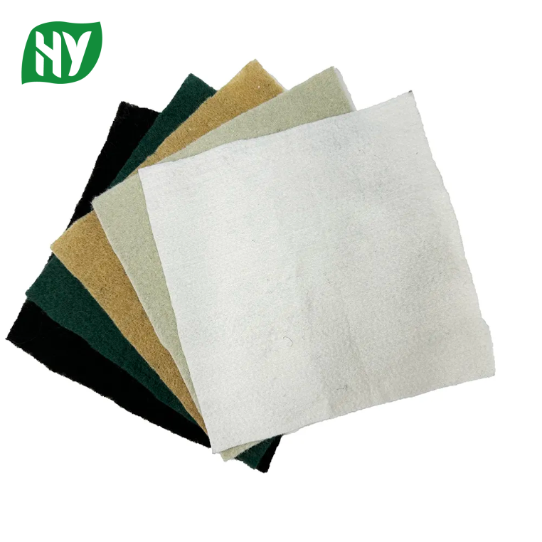 Short fiber needle punched nonwoven geotextile