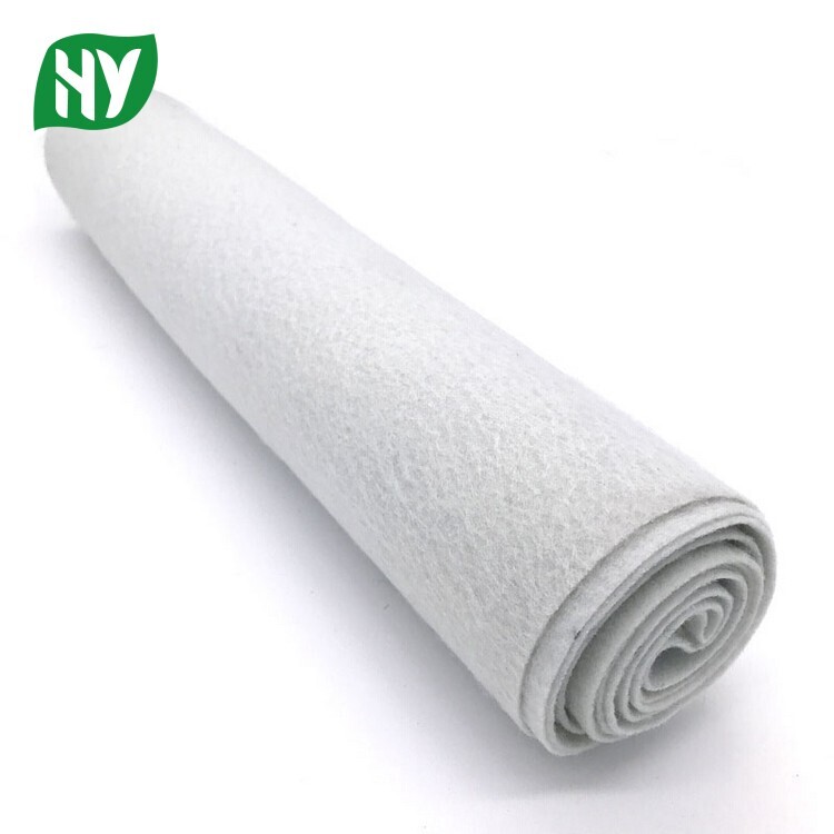 Short fiber needle punched nonwoven geotextile