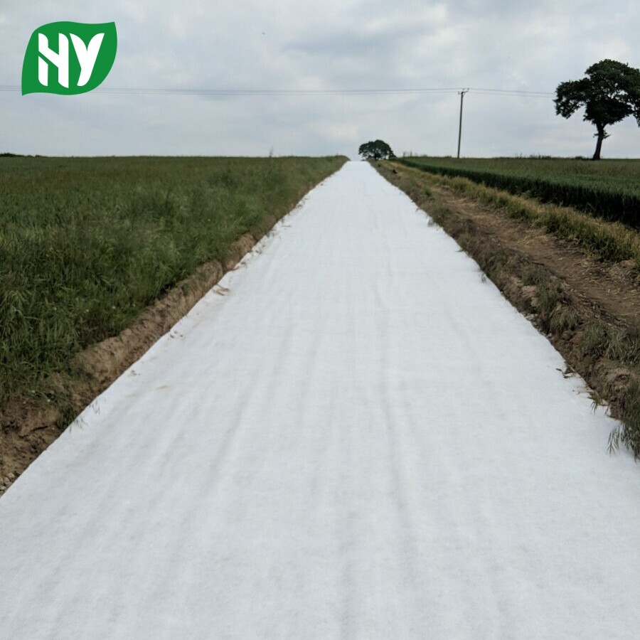 Short fiber needle punched nonwoven geotextile