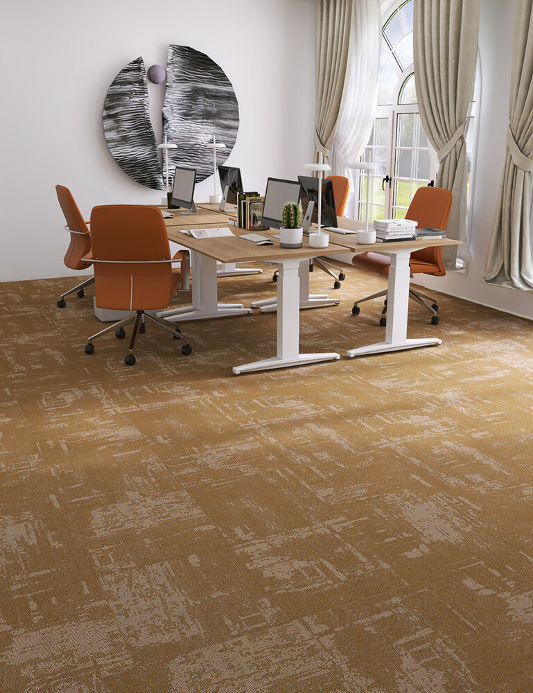 What’s the cost difference between carpet tiles and broadloom carpet?