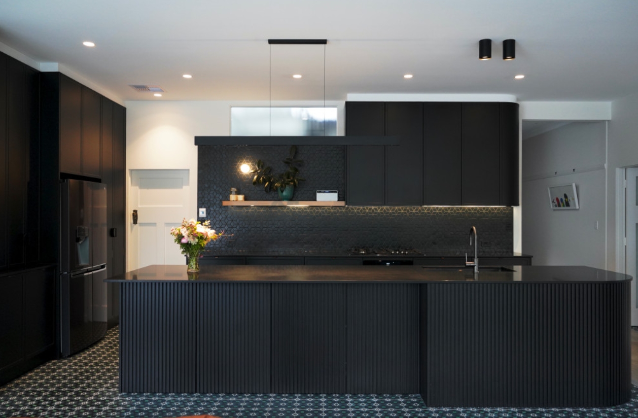 Elegant Kitchen Design: A Symbol of Luxury Living with Its Unique Island Counter and Rich Ambiance