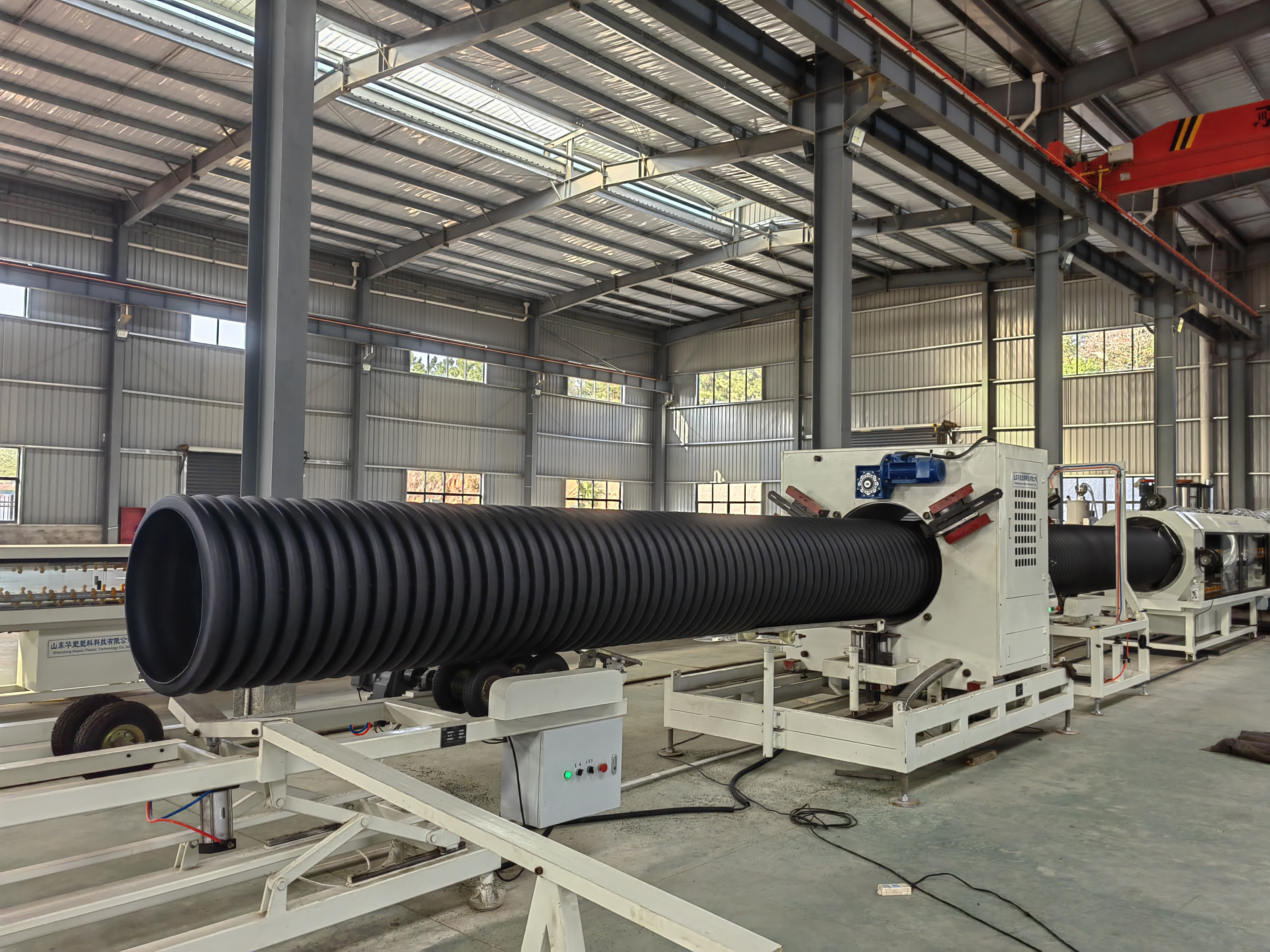 Development history of double wall corrugated pipe line