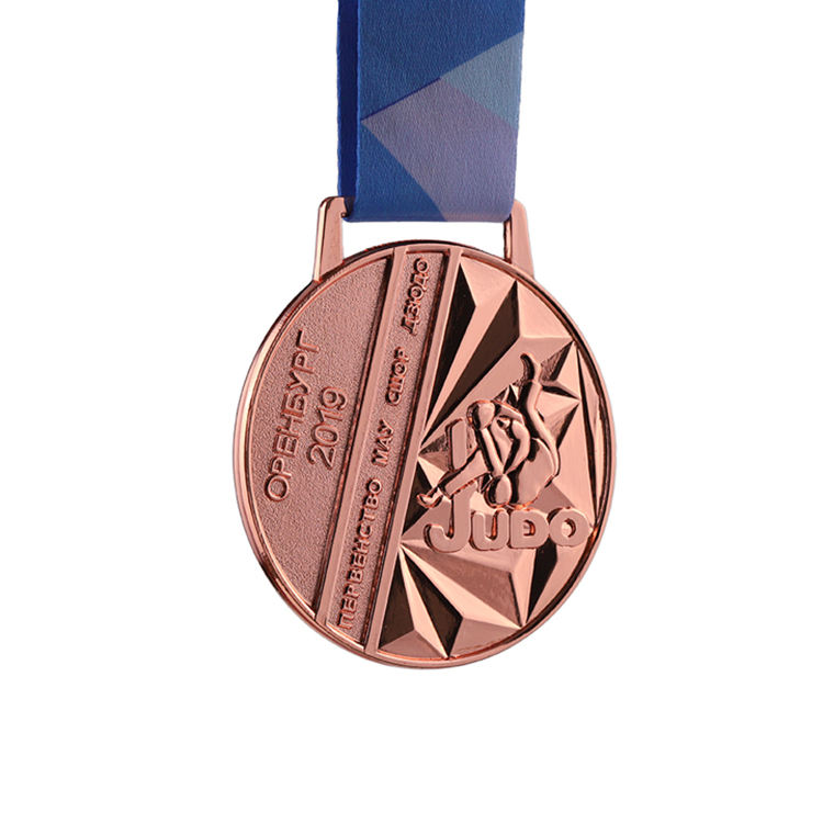 3D gold, silver, and bronze engraved personalized medals for judo, kung fu, karate, and taekwondo, with ribbons.