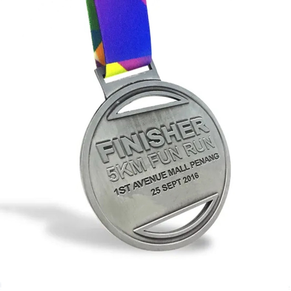 Customized sports medals for gymnastics and dance, featuring UV screen printing and embossed design; ideal for business gifts.