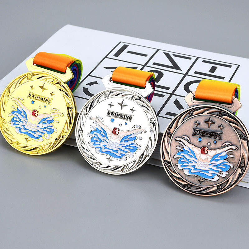 OEM/ODM design of metal swimming, cycling, and running medals; custom zinc alloy enamel medals; triathlon medals.