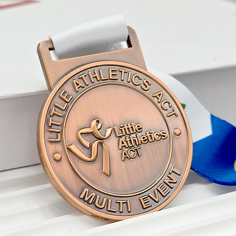 Vintage bronze metal medal, commemorative 3D logo relief for Australian youth athletics multi-sport events, collectible sports event ornament.
