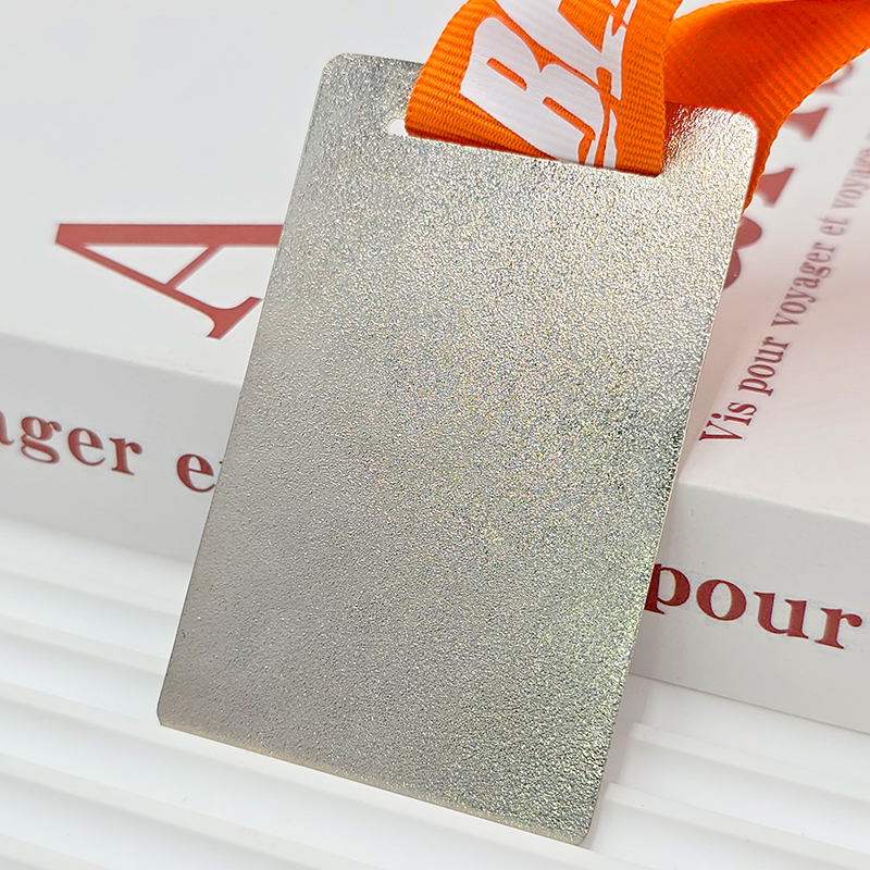 Silver and orange color-blocked metallic medal, commemorative bear head relief for outdoor running events, collectible ornament.