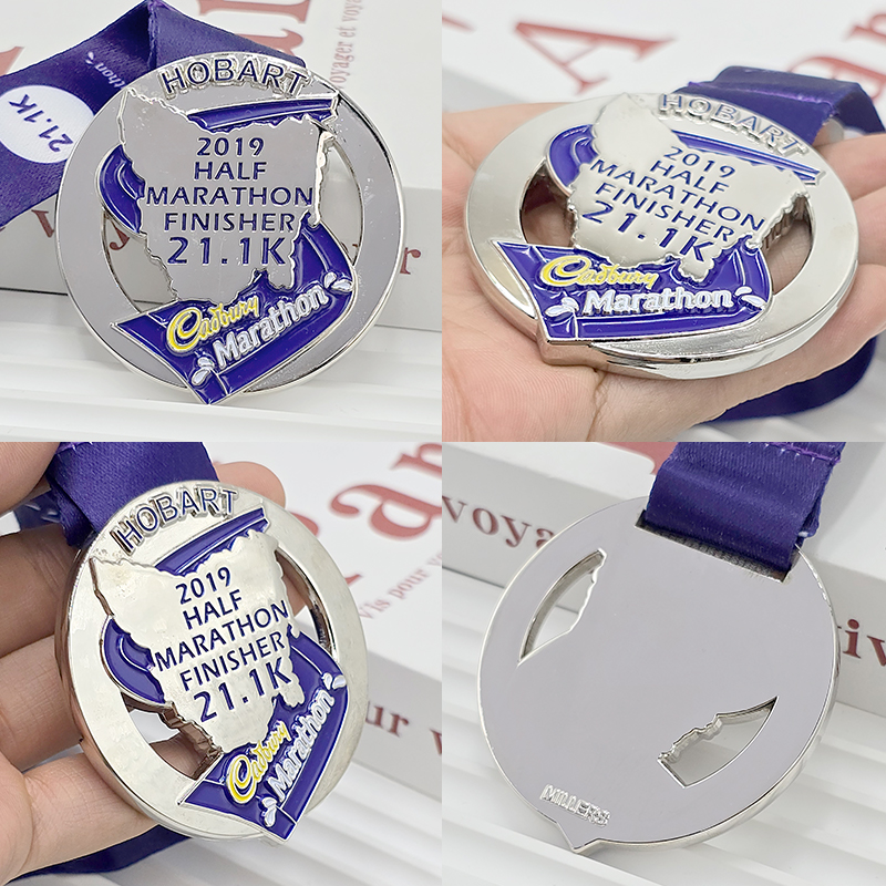 Metal medal, Hobart Half Marathon commemorative city silhouette relief, Cadbury sponsored event collectible.
