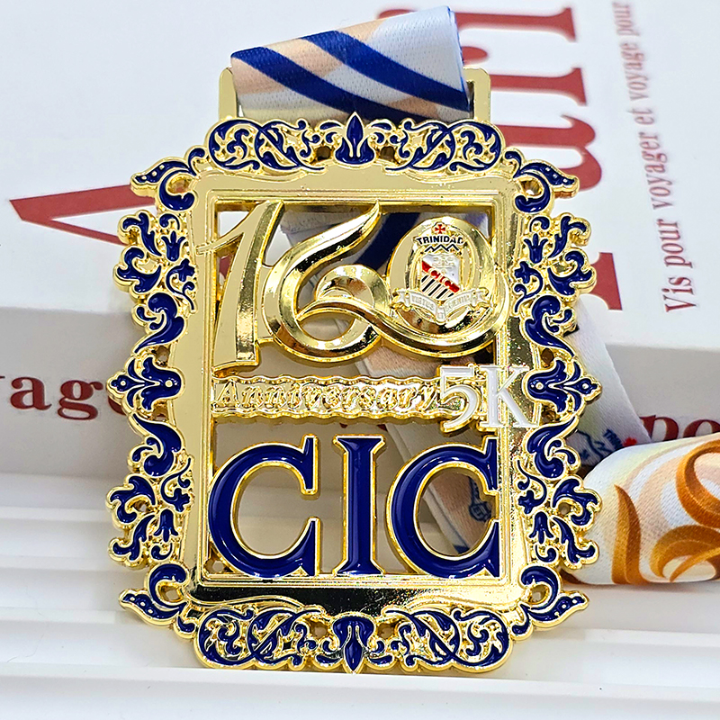 Gold and blue color-blocked metal medals, commemorative sports event items, retro-style floral patterns, lettering, 3D relief, sports event collectibles.