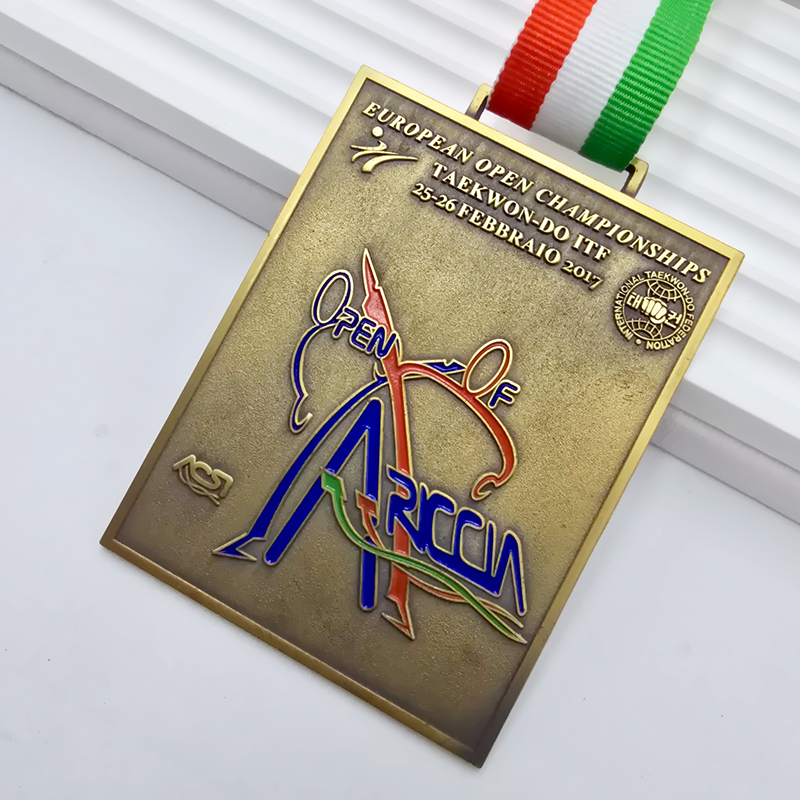 Vintage gold metal medal, commemorative colored 3D relief of the European ITF Taekwondo Open, Italian event collectible.