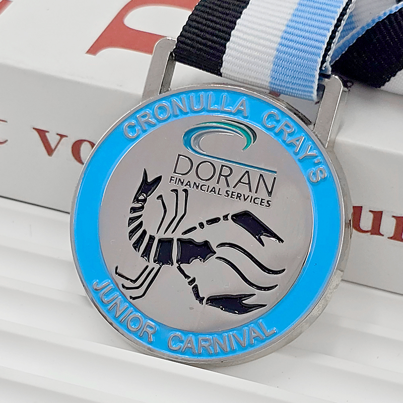 Silver and blue color-blocked metal medal, commemorative 3D crab relief sculpture for youth carnival, collectible item.