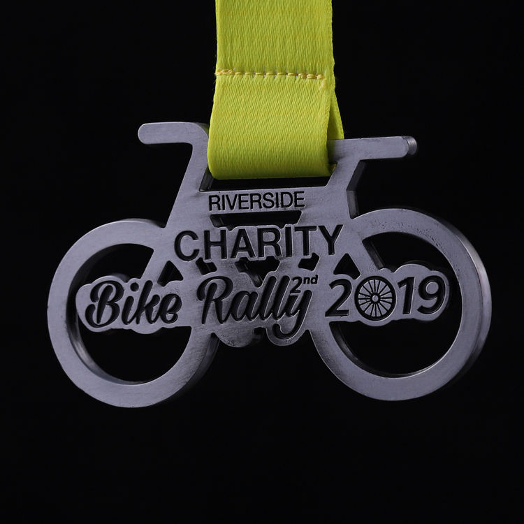 Charity bike rally medal, distressed silver openwork metal commemorative badge, cycling race charm.