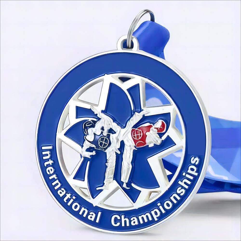 Gold, silver, and bronze medals for martial arts competitions; three-dimensional relief medals with openwork ring patterns.