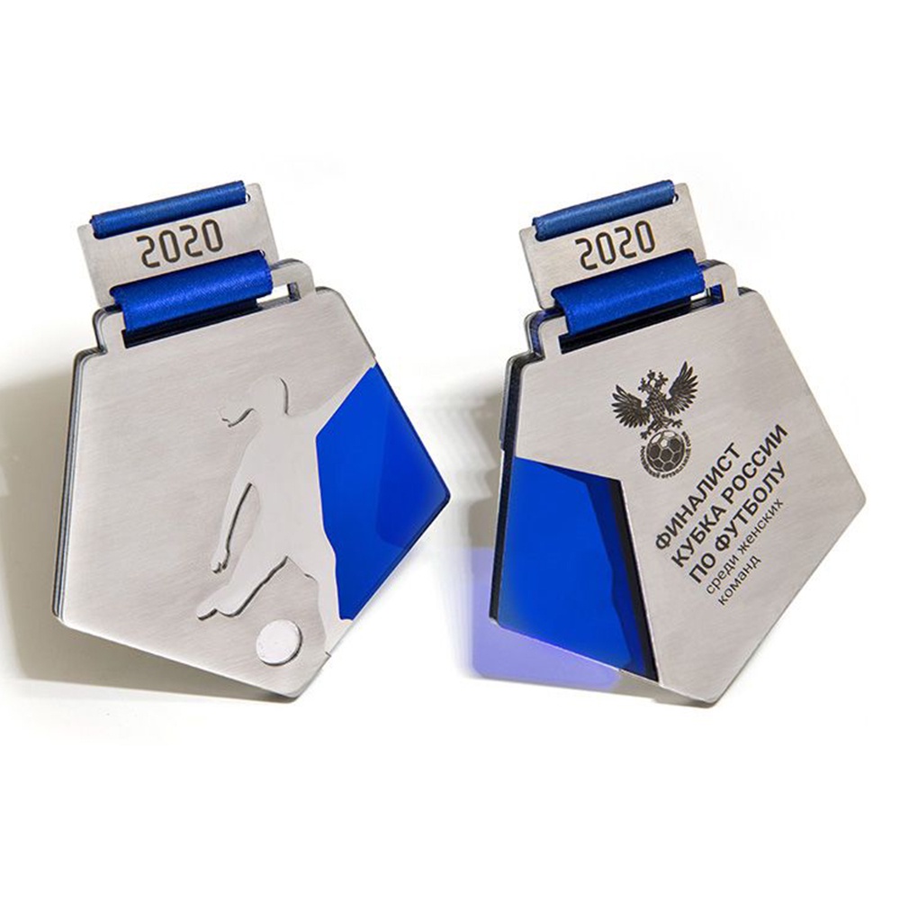 Basketball tournament medals, gold and silver heart-shaped medals of honor.