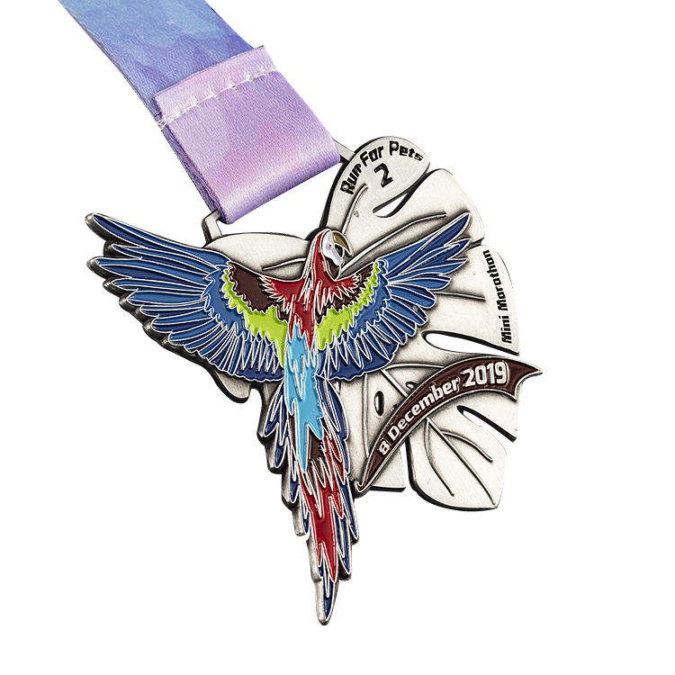 Club race medals; bronze castle landscape relief finisher medals.