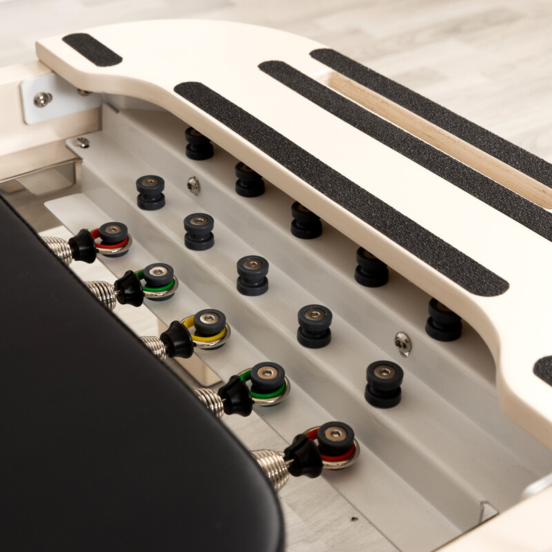 White Rounded Wooden Pilates Reformer