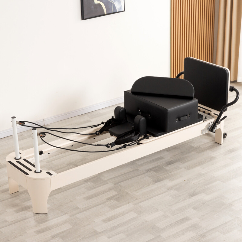 White Rounded Wooden Pilates Reformer