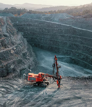 Heavy-duty loader attachments for ore excavation, transportation, and rugged site operations.