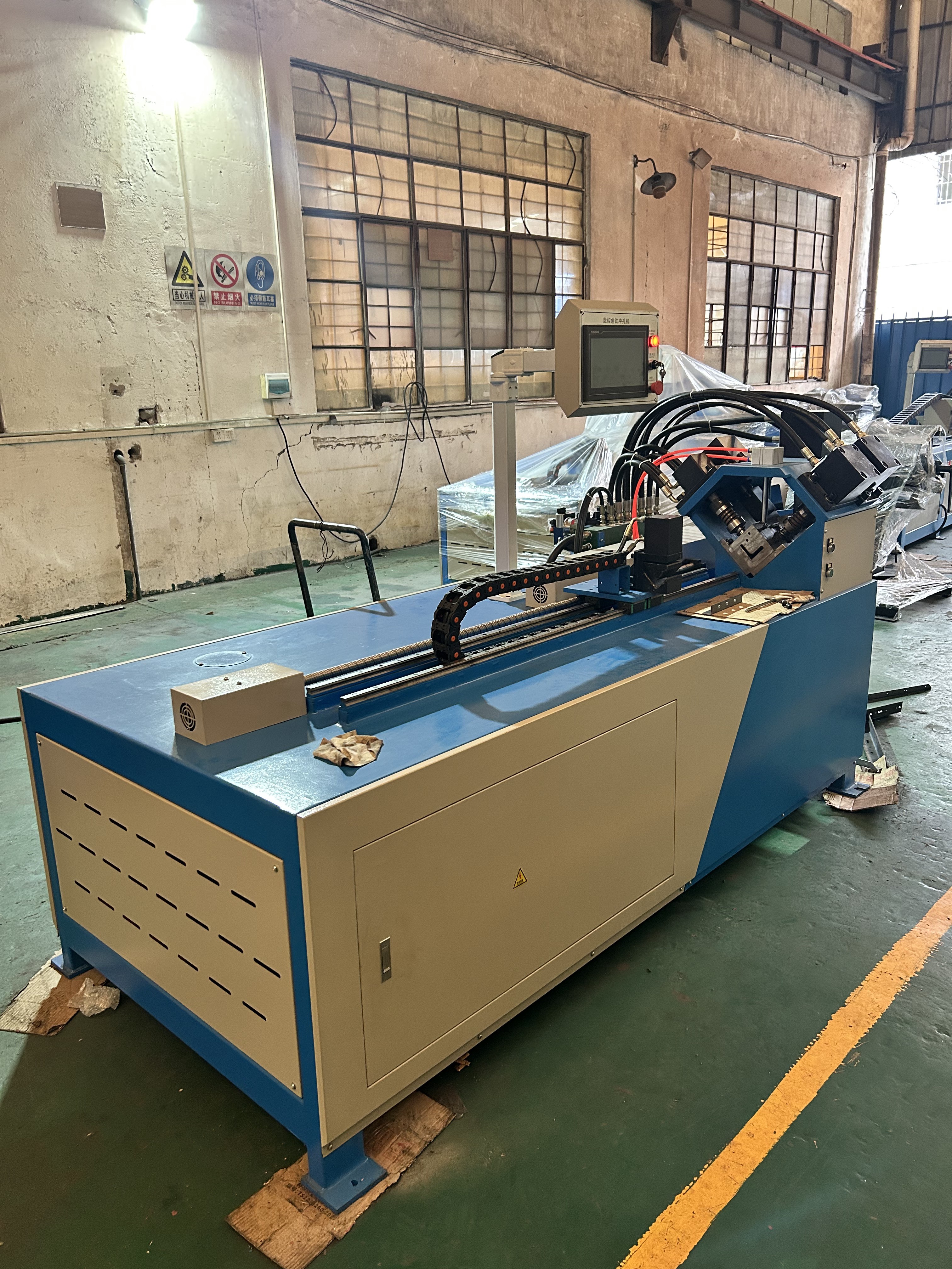 Angle iron flange punching machine