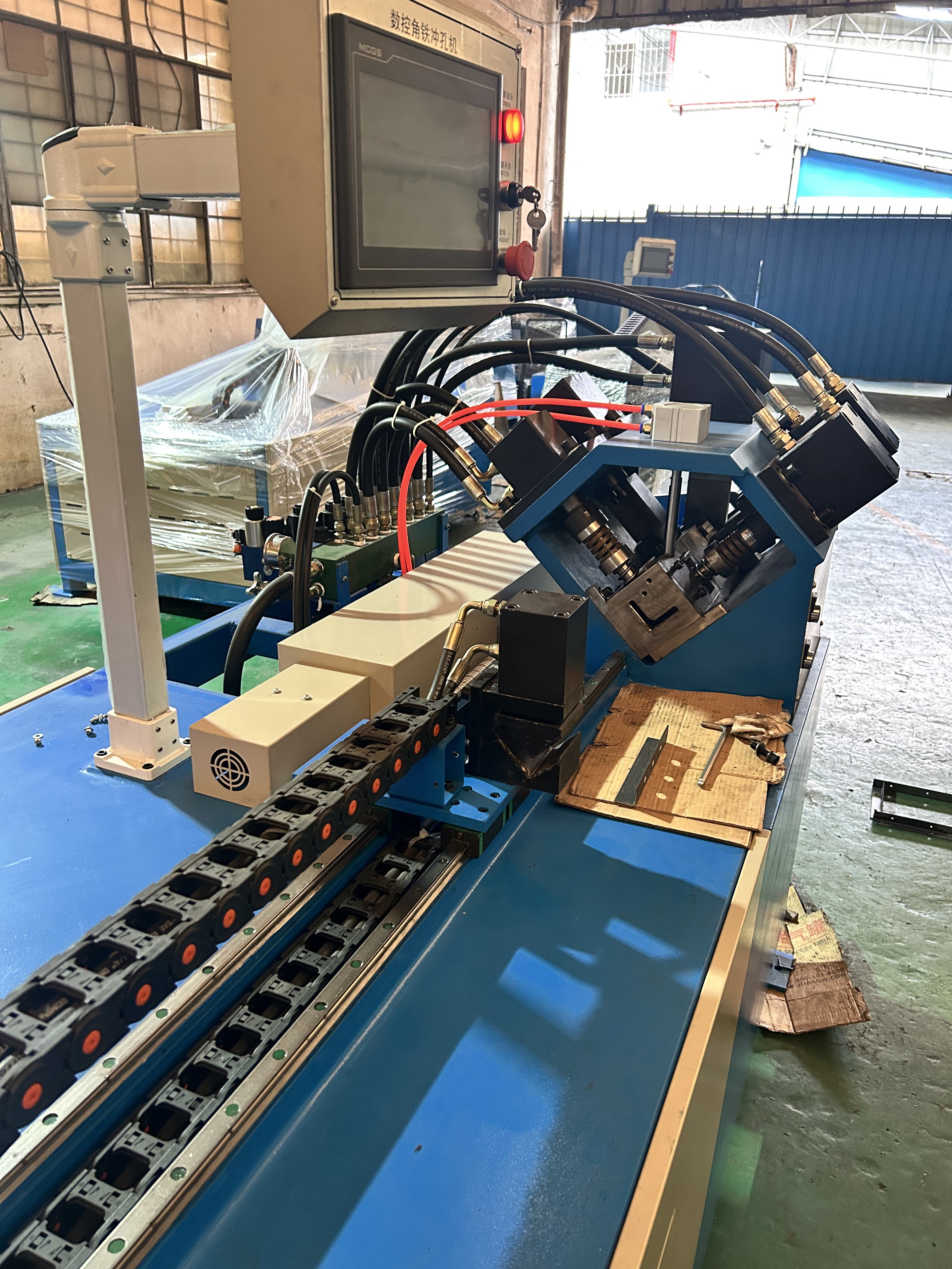 Angle iron flange punching machine