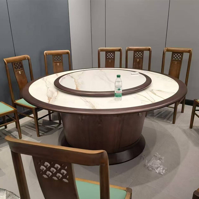 Modern minimalist round dining table for restaurants and banquet halls, featuring a rotatable tabletop with a selection of high-quality turntables.