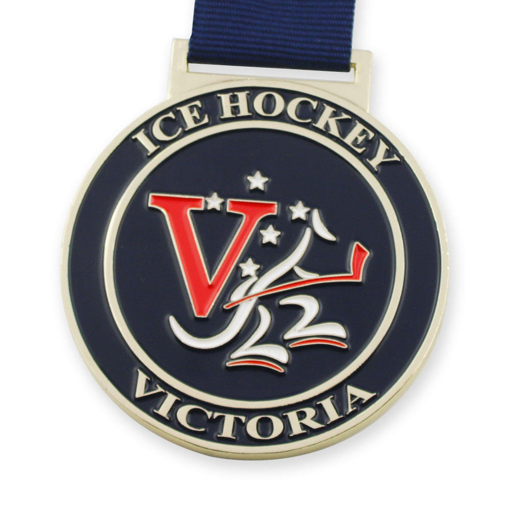 Medalla del Torneo de Hockey sobre Hielo de Victoria: galardón metálico esmaltado en azul