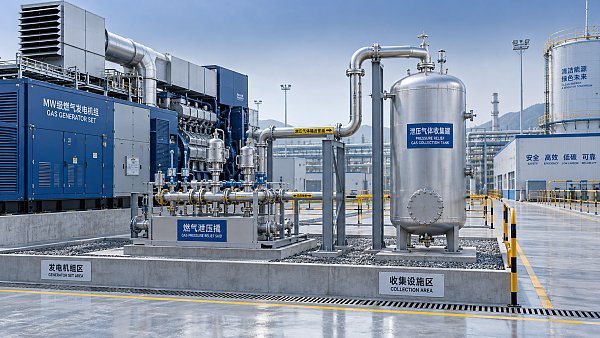 Where should a gas pressure relief skid discharge safely?