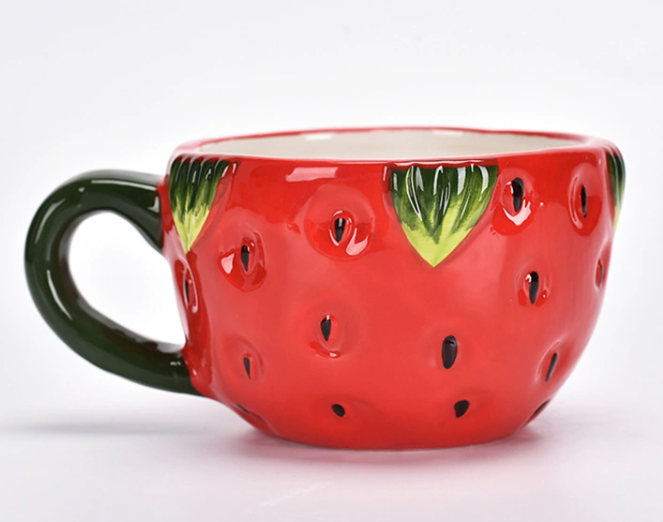 Strawberry-shaped ceramic mug 
