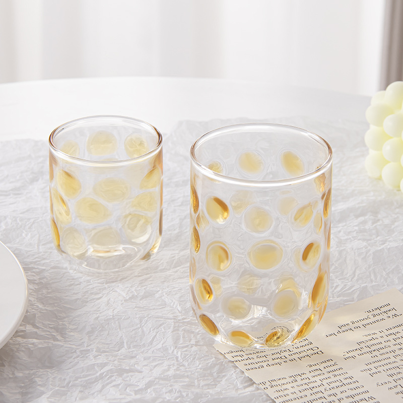 Polka dot painted glass cup