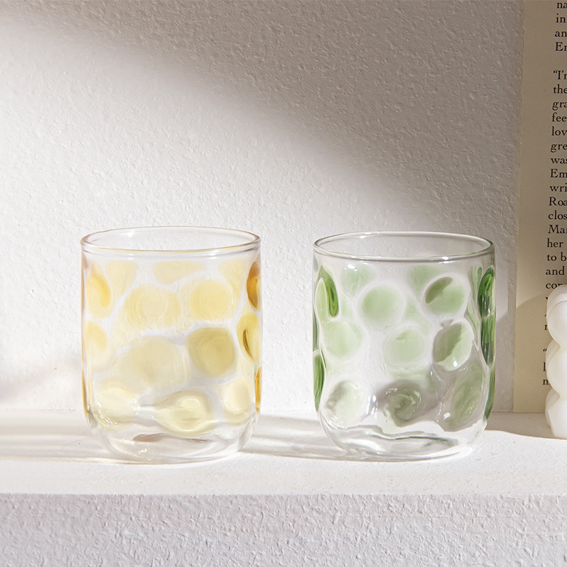 Polka dot painted glass cup